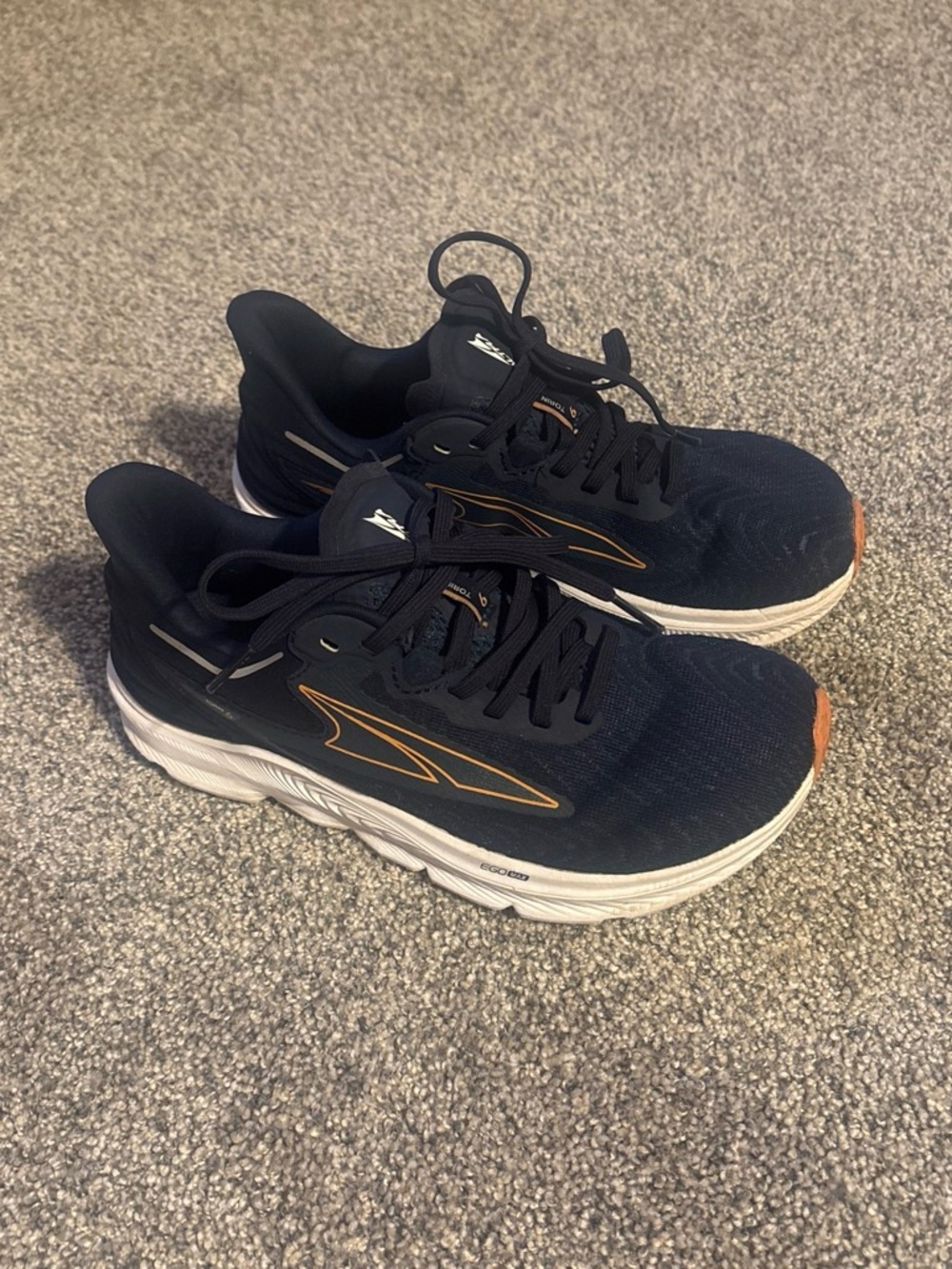 Altra Black Running Shoes with Orange Accents